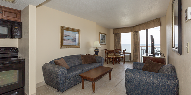 Rejuvenate after a sunny day on the beach in the Oceanfront One Bedroom King Suite, featuring one king bed, one full sleeper sofa and one bath. Save money by cooking in using the fully equipped kitchen and enjoy a meal overlooking the beach.