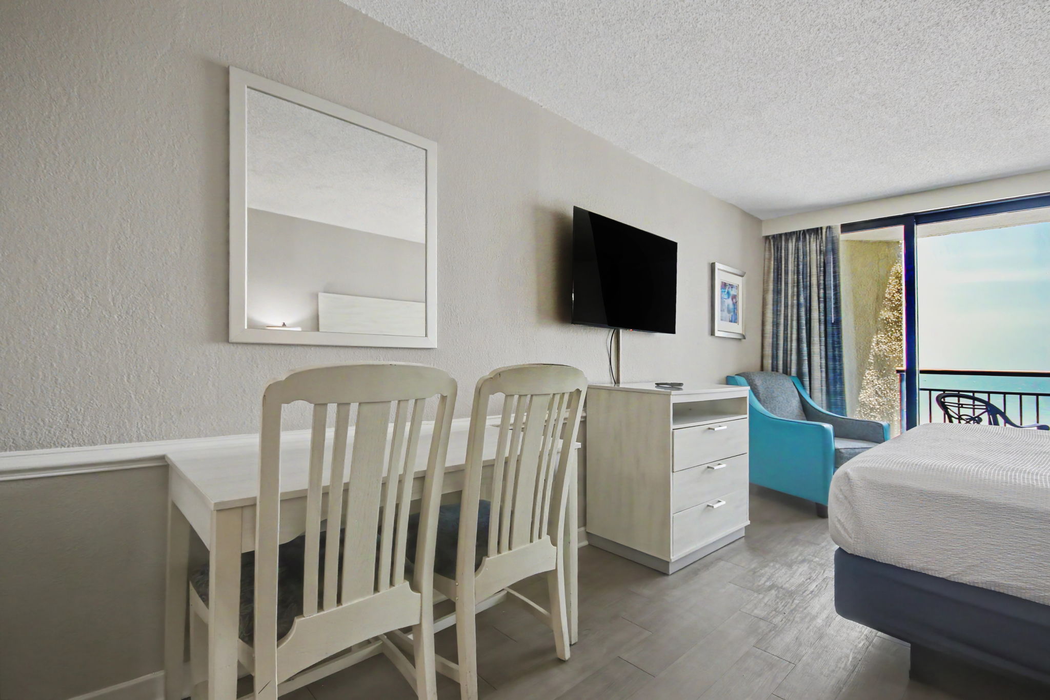 Features 1 California king bed, a full sleeper sofa, 1 bathroom, a fully-equipped kitchen, and a private balcony with oceanfront view.